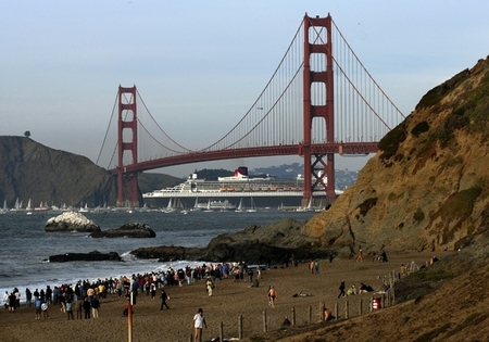 Guided by bar pilot and Petaluman Tom Miller, 49, the  Queen Mary 2, makes her inaugural passage into San Francisco Bay Sunday afternoon.  According to a Port of San Francisco spokesperson Renee Dunn, the Queen Mary 2 is largest ship to ever to enter the Golden Gate and come to port in San Francisco  After picking up around 2000 passengers Monday morning,  the luxury ship will depart and continue on a world tour.
